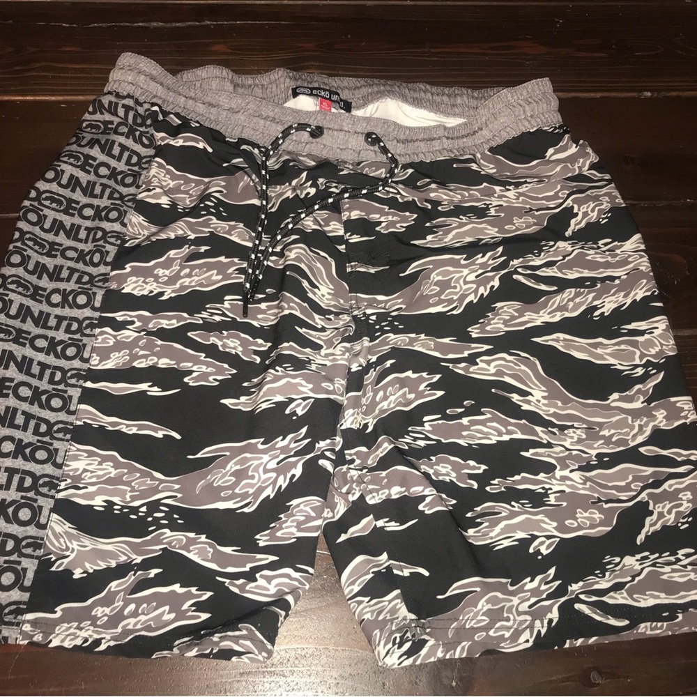 These are Echo swimming or surfing shorts…